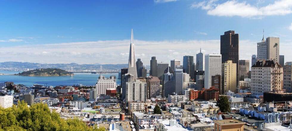 Vacation Travel Innovation view of the San Francisco skyline and bay on a clear day.